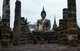 Thailand: Monks prostate before a Buddha, Wat Mahathat, Sukhothai Historical Park
